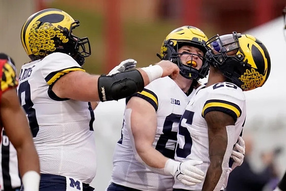 Andrew Vastardis (68), Luke Schoonmaker (86), and Hassan Haskins (25)