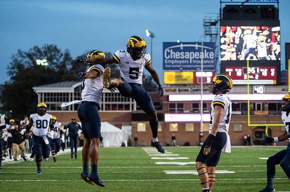 Trente Jones (80), Cornelius Johnson (6), Mike Sainristil (5), Roman Wilson (14), and Donovan Edwards (7)