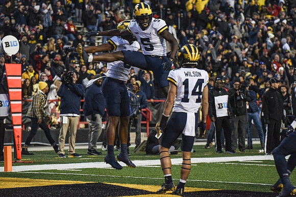 Cornelius Johnson (6), Mike Sainristil (5), and Roman Wilson (14)