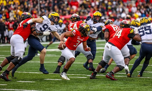 Aidan Hutchinson (97) and David Ojabo (55)
