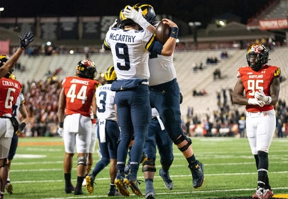A.J. Henning (3) and J.J. McCarthy (9)
