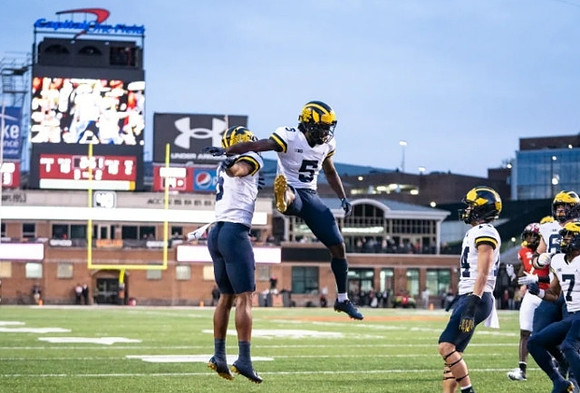 Cornelius Johnson (6), Mike Sainristil (5), Roman Wilson (14), and Donovan Edwards (7)