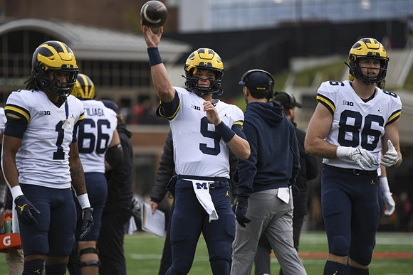 Andrel Anthony (1), Chuck Filiaga (66), J.J. McCarthy (9), and Luke Schoonmaker (86)