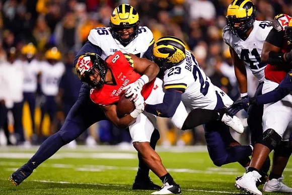 Donovan Jeter (95), Michael Barrett (23), and Nikhai Hill-Green (41)