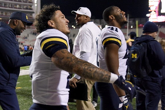 Blake Corum (2) and Nikhai Hill-Green (41)