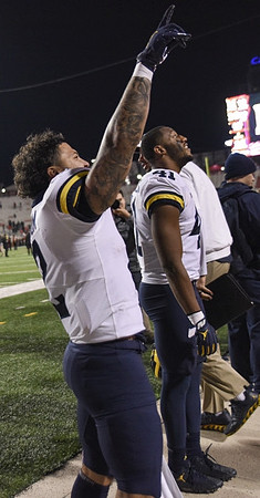 Blake Corum (2) and Nikhai Hill-Green (41)