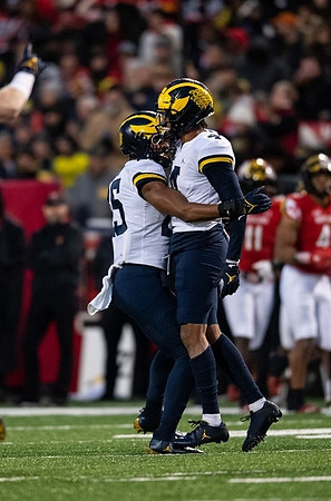 David Ojabo (55) and Vincent Gray (4)