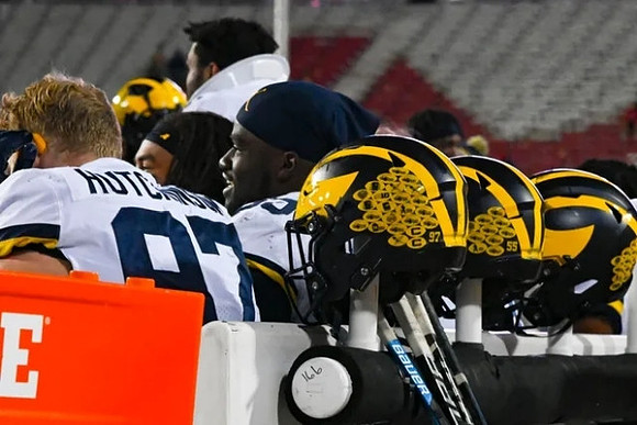 Aidan Hutchinson (97) and David Ojabo (55)