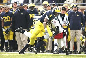 Brandon Minor, Steve Breaston, and Lloyd Carr