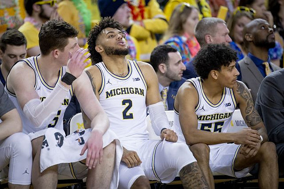 Jon Teske (15), Isaiah Livers (2), and Eli Brooks (55)