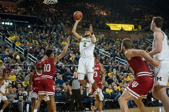 Isaiah Livers (2) and Jon Teske (15)