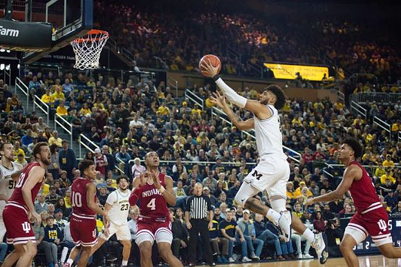 Austin Davis (51), Brandon Johns Jr. (23), and Isaiah Livers (2)