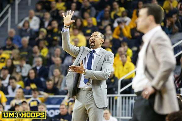 Juwan Howard and Indiana Head Coach Archie Miller