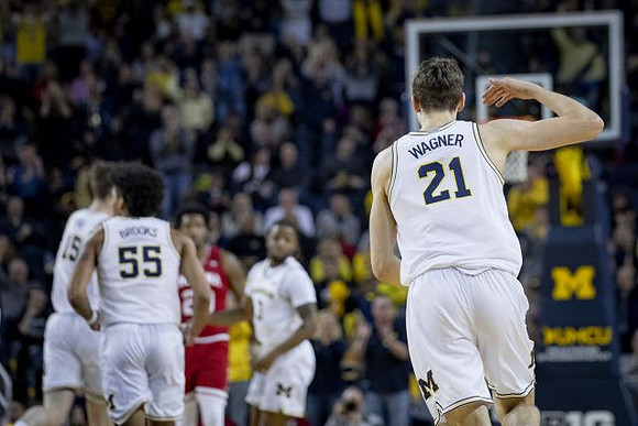 Jon Teske (15), Eli Brooks (55), Zavier Simpson (3), and Franz Wagner (21)