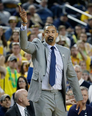 Juwan Howard and Phil Martelli