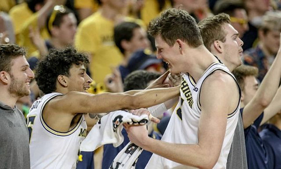 Luke Wilson (32), Eli Brooks (55), Jon Teske (15), and Jaron Faulds (44)