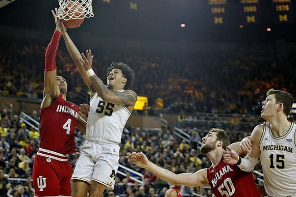 Eli Brooks (55) and Jon Teske (15)