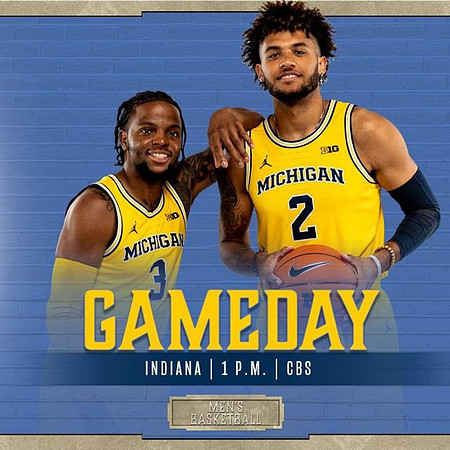 Zavier Simpson (3) and Isaiah Livers (2)