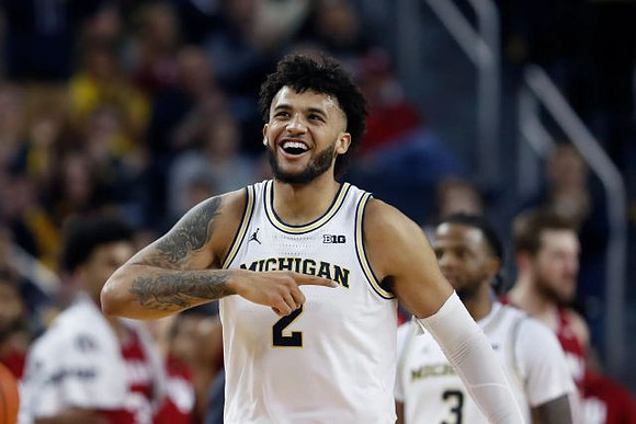 Isaiah Livers (2) and Zavier Simpson (3)