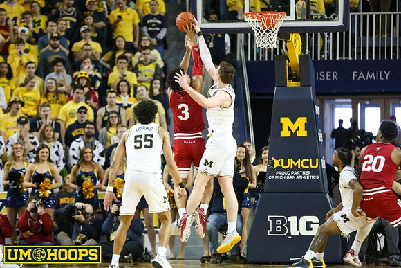 Eli Brooks (55), Jon Teske (15), and Zavier Simpson (3)