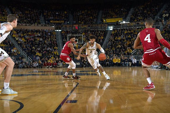 Jon Teske (15) and Isaiah Livers (2)