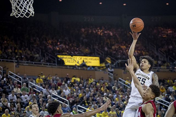 Franz Wagner (21) and Eli Brooks (55)