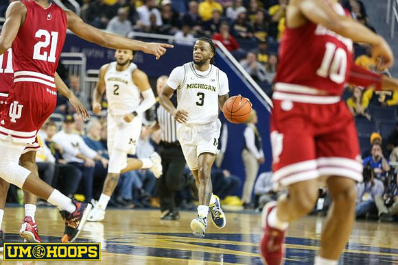 Isaiah Livers (2) and Zavier Simpson (3)