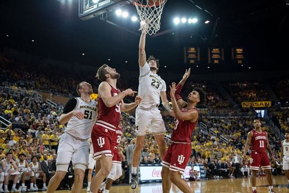 Austin Davis (51), Brandon Johns Jr. (23), and David DeJulius (0)