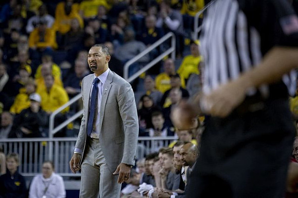 Juwan Howard and Saddi Washington