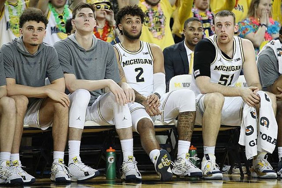 Adrien Nunez (5), Colin Castleton (11), Isaiah Livers (2), and Austin Davis (51)