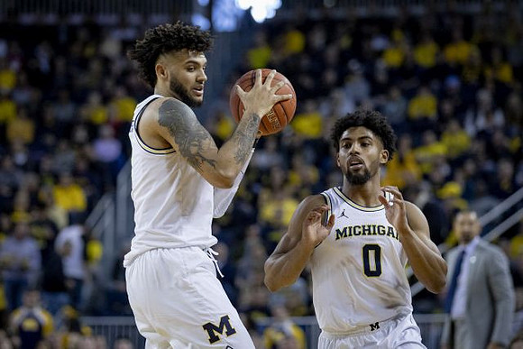 Isaiah Livers (2) and David DeJulius (0)