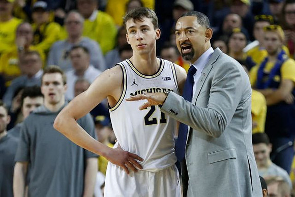 Franz Wagner (21) and Juwan Howard