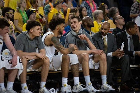 Jon Teske (15), Adrien Nunez (5), Isaiah Livers (2), Franz Wagner (21), Saddi Washington, and Howard Eisley