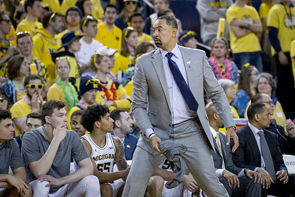 Adrien Nunez (5), Colin Castleton (11), Eli Brooks (55), Juwan Howard, Saddi Washington, and Howard Eisley
