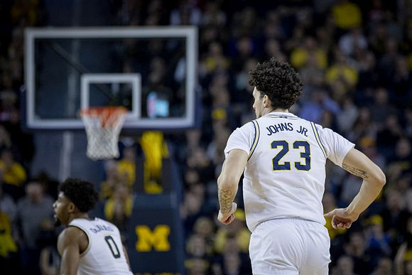 David DeJulius (0) and Brandon Johns Jr. (23)