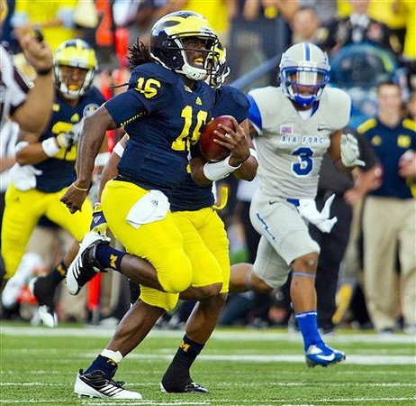 Denard Robinson (16) and Roy Roundtree (21)