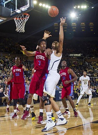 Jon Horford (15) and Zak Irvin (21)