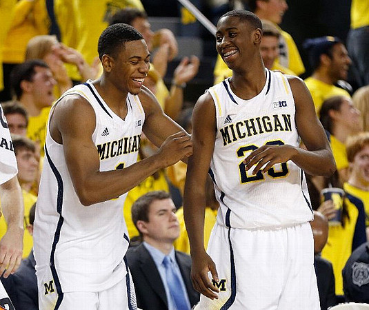 Glenn Robinson III (1) and Caris LeVert (23)
