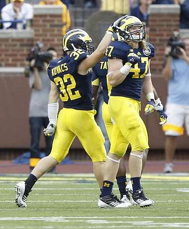 Jordan Kovacs (32), Jake Ryan (47), and Raymon Taylor (6)