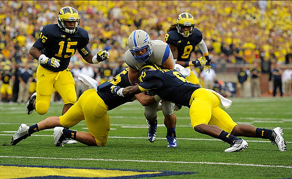 James Ross (15), Jibreel Black (55), Raymon Taylor (6), and J.T. Floyd (8)