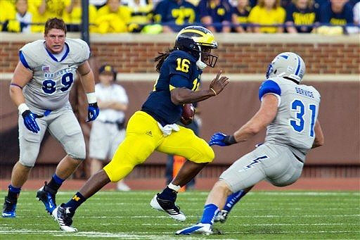 Denard Robinson (16)