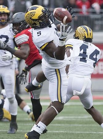 Ben Gedeon (42), Jabrill Peppers (5), and Delano Hill (44)