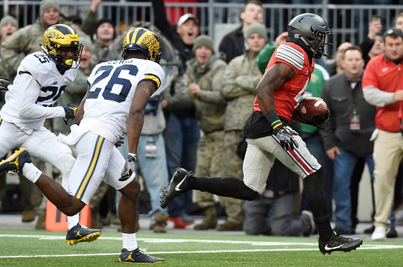 Dymonte Thomas (25) and Jourdan Lewis (26)