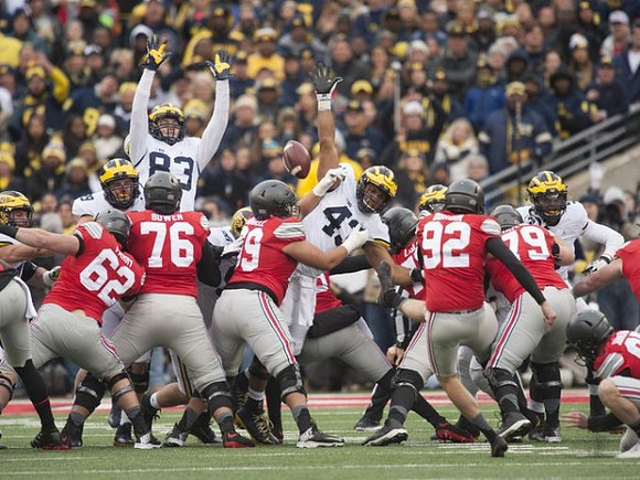 Zach Gentry (83) and Chris Wormley (43)