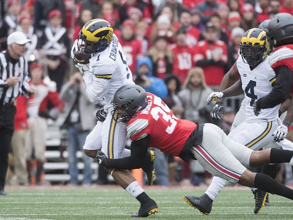 Kekoa Crawford (1) and De'Veon Smith (4)
