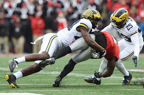 Jourdan Lewis (26) and Dymonte Thomas (25)