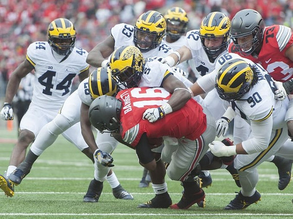 Delano Hill (44), Jourdan Lewis (26), Taco Charlton (33), Ben Gedeon (42), and Bryan Mone (90)