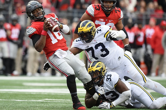 Taco Charlton (33) and Maurice Hurst (73)