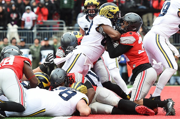 Erik Magnuson (78), Jake Butt (88), Khalid Hill (80), and Henry Poggi (19)