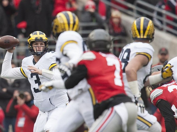 Wilton Speight (3) and Jake Butt (88)